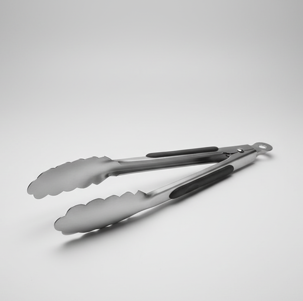 Tång i rostfritt stål - 24 cm